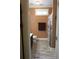 Bathroom with vanity, commode and wood-look flooring, with unique donkey-themed decor at 230 Ryan Ln, Covington, GA 30014