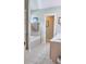 Bathroom featuring a separate shower and bathtub, enhancing convenience and luxury in the home at 230 Ryan Ln, Covington, GA 30014
