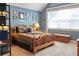 Bedroom offers a light-filled space with comfortable bed and a serene atmosphere for relaxation and rest at 230 Ryan Ln, Covington, GA 30014