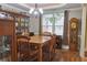 Dining room showcasing hardwood floors and a wooden table, perfect for entertaining at 230 Ryan Ln, Covington, GA 30014