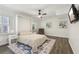Bedroom with a murphy bed, rug and artwork, creating a cozy and stylish space at 2356 Defoors Ferry Nw Rd, Atlanta, GA 30318