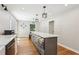 Spacious kitchen featuring an island with cooktop and built-in microwave at 2356 Defoors Ferry Nw Rd, Atlanta, GA 30318