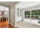 Living room with built-in shelving and sliding glass doors to the outdoor deck at 2356 Defoors Ferry Nw Rd, Atlanta, GA 30318