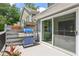Patio with outdoor kitchen, grill, and patio furniture at 2356 Defoors Ferry Nw Rd, Atlanta, GA 30318