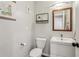 Powder room with modern vanity, square mirror, and gray walls at 2356 Defoors Ferry Nw Rd, Atlanta, GA 30318