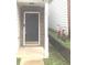 Close-up of the front entrance featuring a gray door and house number at 2849 Windsor Forrest Ct, Atlanta, GA 30349