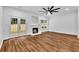 Spacious living room with hardwood floors, fireplace, and access to the yard at 2849 Windsor Forrest Ct, Atlanta, GA 30349