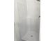 This is a white stand up shower at 2849 Windsor Forrest Ct, Atlanta, GA 30349
