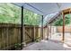 Brick patio underneath elevated deck, adjacent to backyard area at 2920 Waverly Place Dr, Dacula, GA 30019