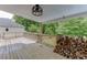 Inviting wooden backyard deck, perfect for outdoor entertaining, overlooks a beautifully treed backyard at 2920 Waverly Place Dr, Dacula, GA 30019