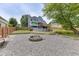Wide backyard featuring a pool, wooden deck, swing set, fire pit and ample green space at 2920 Waverly Place Dr, Dacula, GA 30019