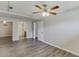 Finished basement featuring wood flooring and neutral paint; access to bathroom and storage at 2920 Waverly Place Dr, Dacula, GA 30019