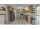 Functional kitchen with stainless steel appliances, wooden cabinetry, and access to the backyard at 2920 Waverly Place Dr, Dacula, GA 30019