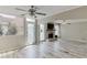 Inviting living room with fireplace, large windows and modern flooring at 2920 Waverly Place Dr, Dacula, GA 30019