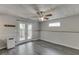 Relaxing living room with neutral walls, lots of light, and doors leading to the exterior at 2920 Waverly Place Dr, Dacula, GA 30019