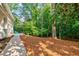 A serene backyard with natural beauty ready for relaxing or entertaining at 4493 Orleans Dr, Dunwoody, GA 30338