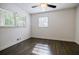 Bright bedroom with hardwood floors and large windows providing natural light at 4493 Orleans Dr, Dunwoody, GA 30338