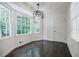 Breakfast nook with large windows and hanging light fixture at 4493 Orleans Dr, Dunwoody, GA 30338