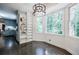 Breakfast nook with large windows, hardwood floors and built-in shelves at 4493 Orleans Dr, Dunwoody, GA 30338