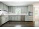 Updated kitchen featuring shaker cabinets, stainless steel appliances, and white countertops at 4493 Orleans Dr, Dunwoody, GA 30338