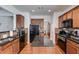 Well-equipped kitchen with dark appliances, granite countertops, and ample cabinet space at 4619 Sweetwater Ave, Powder Springs, GA 30127