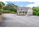 Charming clubhouse with ample parking, a covered front porch, and easy access for neighborhood residents at 6450 Oak Valley Dr, Cumming, GA 30040