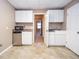 Kitchenette features white cabinets, granite countertops, a stainless steel mini fridge and microwave at 6450 Oak Valley Dr, Cumming, GA 30040