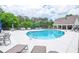 Large community pool with plenty of seating and shade, creating a resort-like atmosphere for residents at 6450 Oak Valley Dr, Cumming, GA 30040