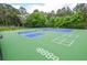 Active recreation is steps away from home with this private, well-maintained tennis and pickleball court at 6450 Oak Valley Dr, Cumming, GA 30040