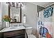 Charming bathroom with vanity, patterned shower curtain, and modern fixtures at 1140 Allgood Rd, Stone Mountain, GA 30083