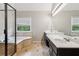 Primary bathroom featuring dual sinks, a shower, a tub, and tile flooring at 2572 Hillgrove Dr, Dacula, GA 30019
