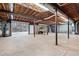 Large unfinished basement with a drive-in door offering easy access to the outside at 355 Clark Creek Pass, Acworth, GA 30102