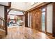 Grand foyer with wooden details, large windows, and an ornate front door creating a warm welcome at 355 Clark Creek Pass, Acworth, GA 30102