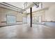 Empty garage with three bays and high ceilings at 355 Clark Creek Pass, Acworth, GA 30102