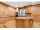 Gourmet kitchen features custom wood cabinets, a wrap-around island, and stainless steel appliances at 355 Clark Creek Pass, Acworth, GA 30102