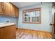 The laundry room has wood cabinets, wood trim and a large window at 355 Clark Creek Pass, Acworth, GA 30102