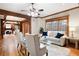 Bright living room featuring wood beams, hardwood floors, and a neutral color palette at 355 Clark Creek Pass, Acworth, GA 30102