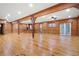 Bright and airy living room features wood floors, wood paneling, exposed beams, and lots of light at 355 Clark Creek Pass, Acworth, GA 30102