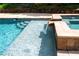 Beautiful pool with waterfall feature and stone accents, perfect for relaxation and enjoyment at 355 Clark Creek Pass, Acworth, GA 30102