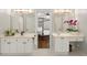 Bright bathroom featuring a dual vanity, custom cabinets, and a glimpse into the main bedroom at 4390 Wicklow Ct, Suwanee, GA 30024