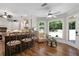 The kitchen features counter seating and windows to the backyard at 4390 Wicklow Ct, Suwanee, GA 30024
