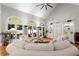Bright and airy living room with a vaulted ceiling, large windows, and comfortable seating at 4390 Wicklow Ct, Suwanee, GA 30024