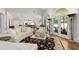 Spacious living room featuring a high ceiling, hardwood floors, and arched windows at 4390 Wicklow Ct, Suwanee, GA 30024
