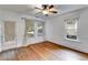 Bright living room with hardwood floors, a ceiling fan and lots of natural light at 959 Hall Nw Pl, Atlanta, GA 30318