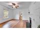 Bright room with hardwood floors and fireplace, complemented by fresh white paint at 959 Hall Nw Pl, Atlanta, GA 30318