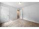 Bedroom featuring plush carpeting, two doors and ample space at 132 2Nd Nw St, Atlanta, GA 30318