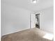 Empty bedroom with neutral carpet, white walls and plenty of natural light at 132 2Nd Nw St, Atlanta, GA 30318