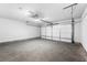 Clean, spacious garage with concrete floor and automatic door at 132 2Nd Nw St, Atlanta, GA 30318