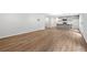 Open-concept living space flows seamlessly into a modern kitchen with gray cabinetry at 132 2Nd Nw St, Atlanta, GA 30318