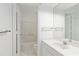 Bright bathroom featuring tile floor, shower and tub combination, and a large vanity mirror at 165 River North Walk, Atlanta, GA 30328
